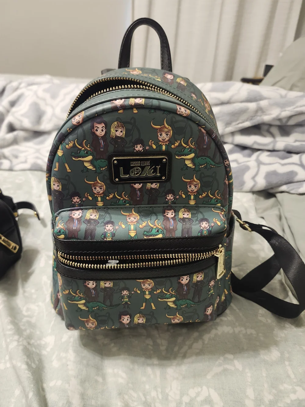 Loungefly Green Loki Character Mini Backpack with Gold Hardware